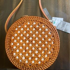 Genuine leather Made in Vietnam rattan cross body bag.